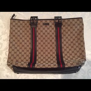 Gucci overnight tote.  (Zip closure)